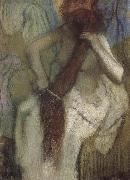 The woman doing up her hair, Edgar Degas